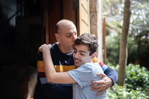 Father and disabled son.