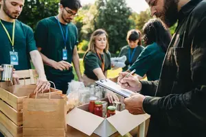 Volunteers packing food boxes